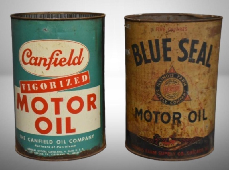 (2) 5 qt. motor oil cans: Canfield Vigorized; Blue Seal/ Illinois Farm Supply