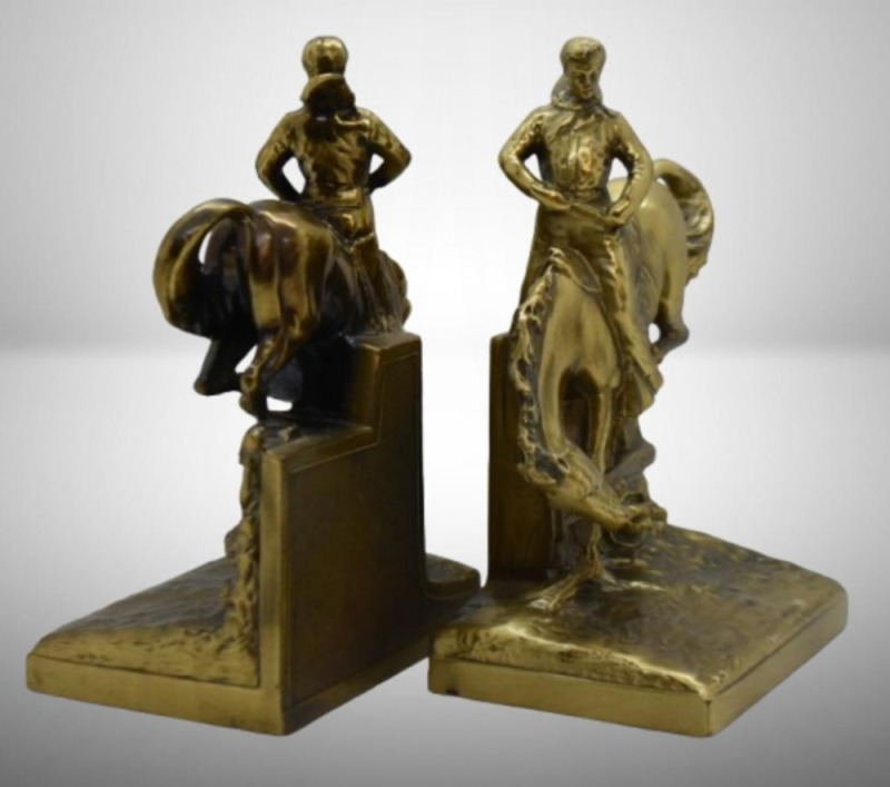Pair of solid cast brass bucking horse and rider bookends by PM Craftsman