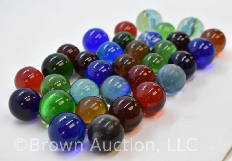 Bag full colored translucent marbles
