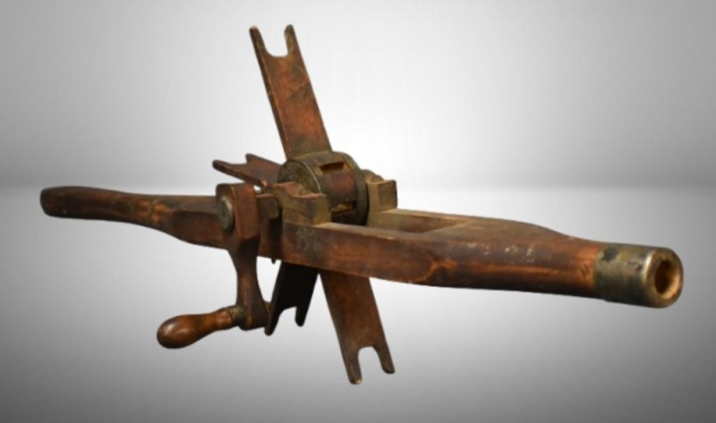 Very early handmade wooden fishing rod/ line reel, Copenhagen Snuff lids used on it date pre-1930's, 32"l