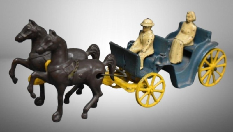 Mrkd. Stanley Toys Cast Iron horse drawn buggy w/ driver and rider