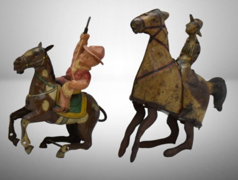 (2) Vintage cowboy wind-up toys