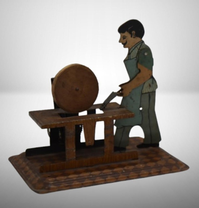 1920's Occupational German tin wind-up man sharpening tools, steam powered grinding stone