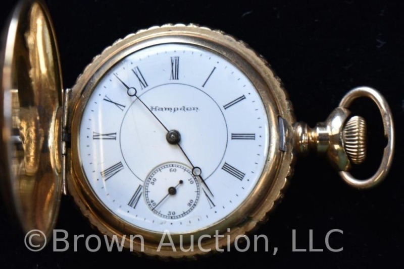 Hampden closed case gold pocket watch, decorative etching, winds and works