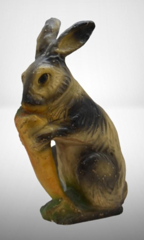 Chalkware 10.25" rabbit nibbling on carrot figurine