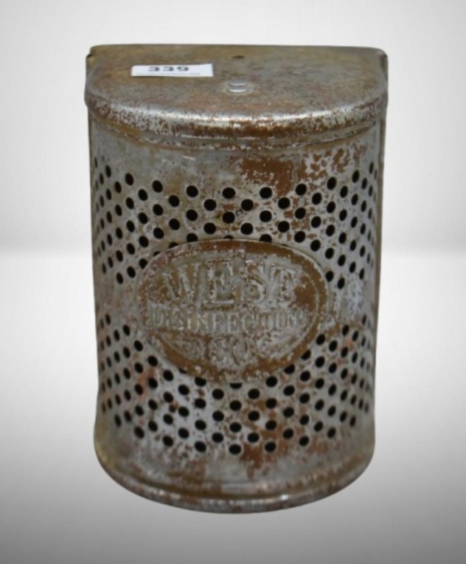 Vintage deodorizer container from the West Disinfecting Co,