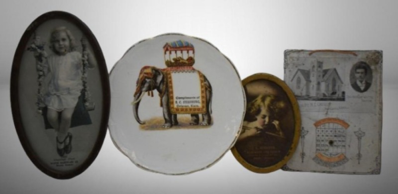 (4) Kansas advertising items: E.C. Steenburg, Delavan, KS 6.25"d plate; J.A. Johnson Hardware and Paints, Mead, KS Cupid Asleep picture; Bloom, KS Hardware Co. picture of young girl; Ashland, KS Main St. M.E. Church tin perpetual calendar