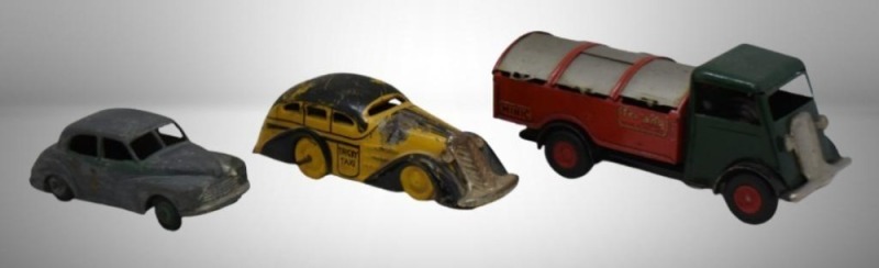 (3) Vintage toys: Dinky Toys car; 1940's Minic Tri-ang wind-up garbage truck (no key); 1930's wind-up Tricky Taxi (no key)