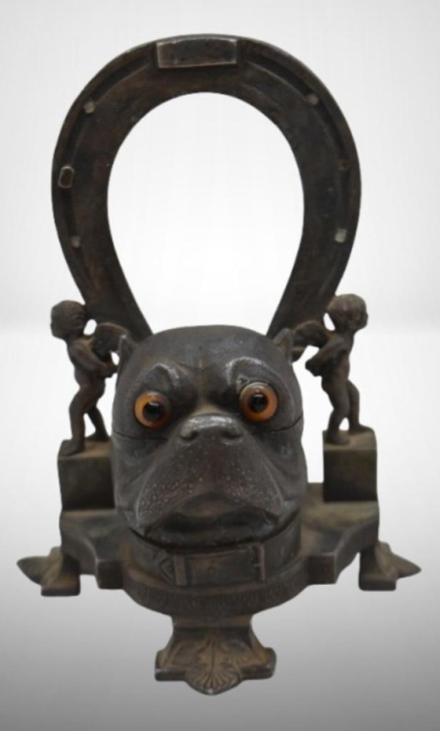 Cast Iron figural ink well featuring bulldog's head, horseshoe and cherubs