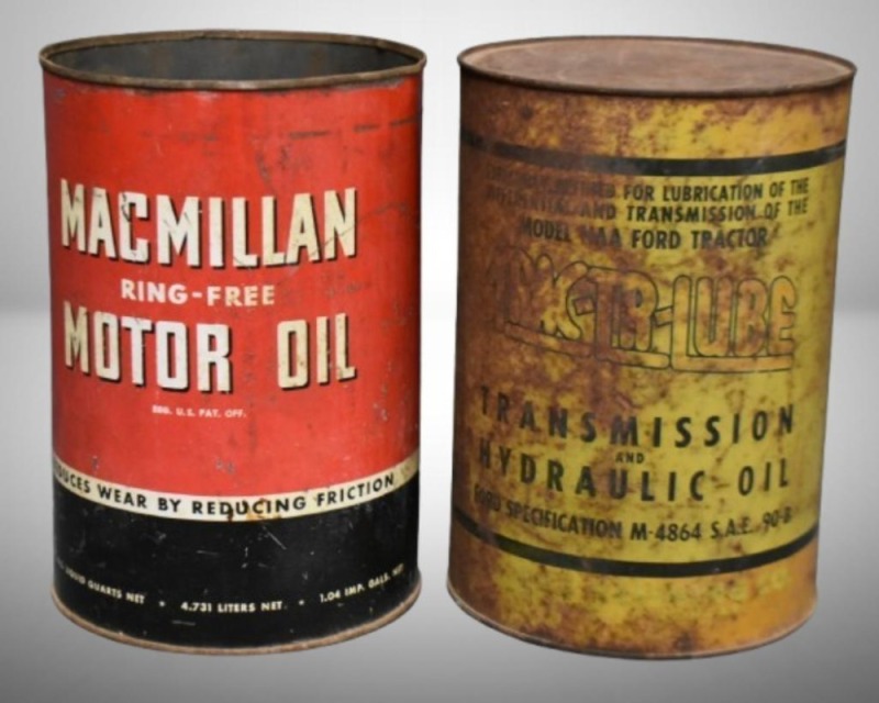 (2) 5 qt. oil cans - Macmillan and Trac-Tr-Lube transmission & hydraulic fluid