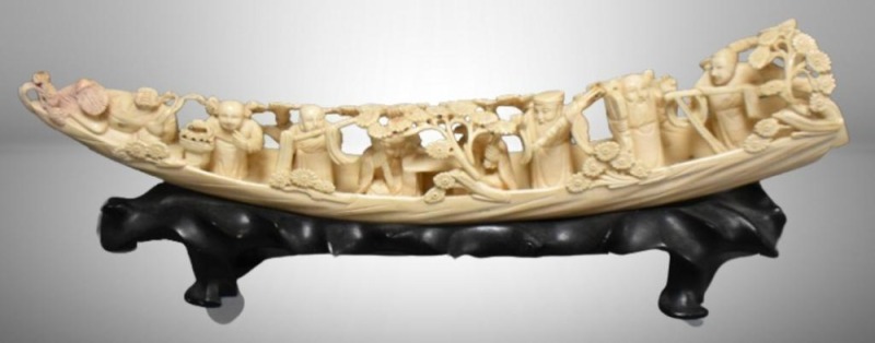 Chinese hand carved ivory 14.5"l boat w/ interesting figures and floral design on stand