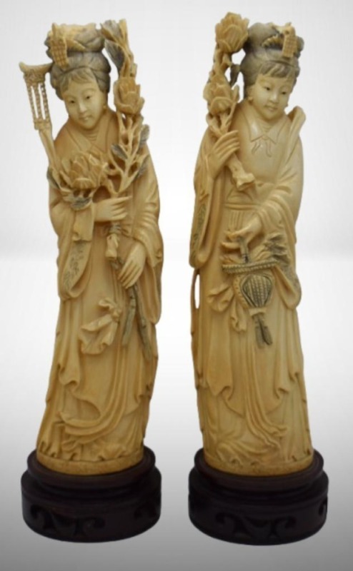 (2) Elaborately carved Chinese resin sculptures featuring a woman deity (spiritual)rines, 11.5" tall