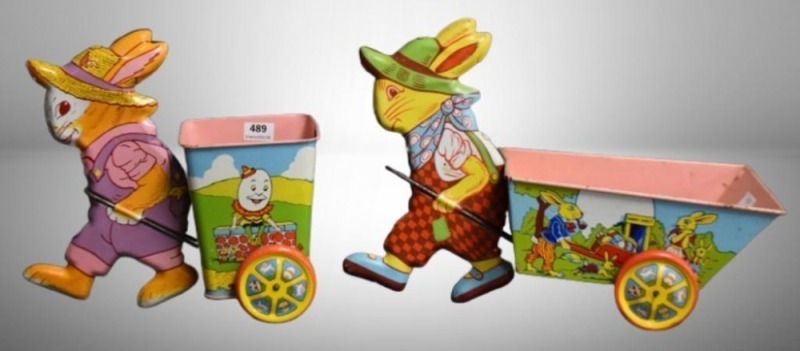 (2) J. Chein tin litho Easter bunnies pulling carts