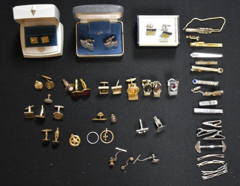 Assortment of men's tie tacks, cuff links, etc.