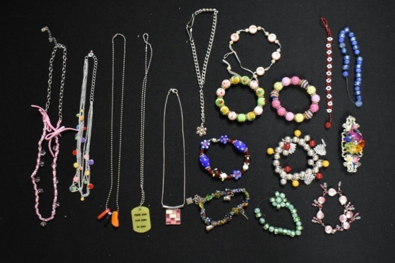 Box lot assortment of colorful jewelry - beaded, novelty, etc.