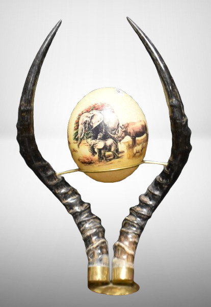 African Art decoupage 6" ostrich egg, South African Art Safari scenes, mounted on impala horns stand