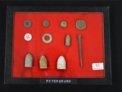 Small display of military relics/ artifacts from Petersburg, VA.