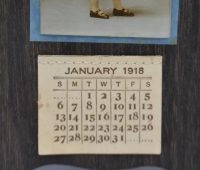 Earl E. Baird Christmas Remembrance advertising calendar on wooden backer, Jan - Dec. 1918 - 3