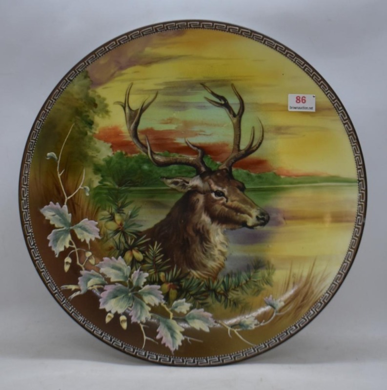 Mrkd. Nippon 10"d HP plate featuring Stag/ buck