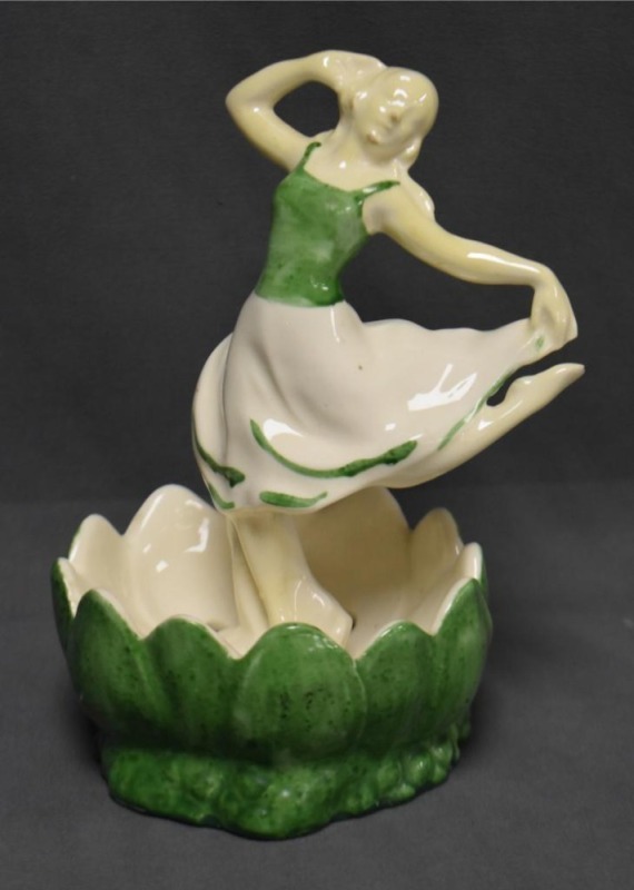 1920-30's Art Deco 6"h dancer positioned in a lily pad flower frog