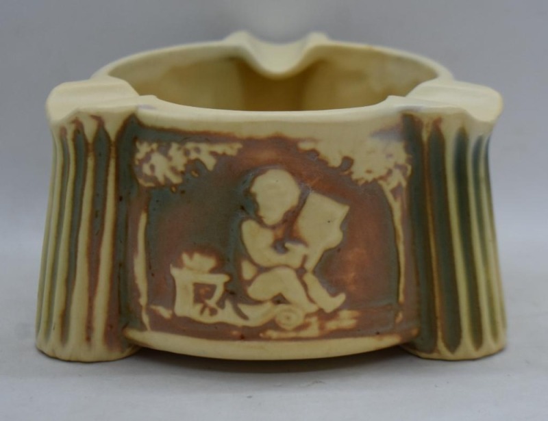 Roseville Donatello ashtray with three cigar rests.