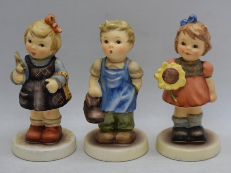 (3) Hummel 3" figurines: Little Seamstress (2007); Little Cobbler (2007, boot backstamp); Sunflower Girl (2003)