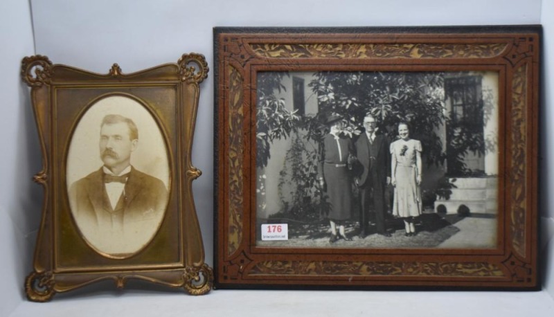 (2) Free standing picture frames: Art Deco tin meas. 5.75" x 7.5"; leather meas. 10" x 8.25"