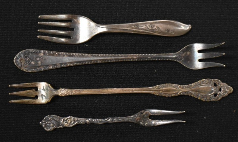 (4) Silver pickle forks - marks incl. Rogers Bros