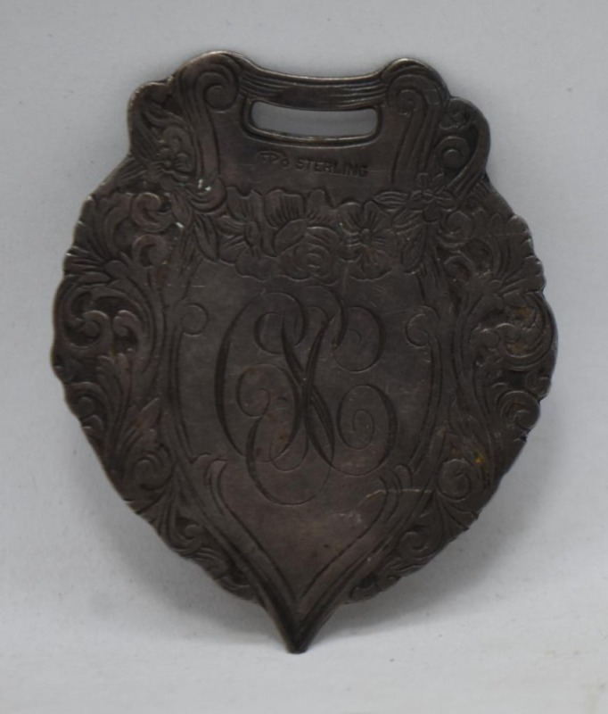 Mrkd. Sterling 2" watch fob? or coat shield?