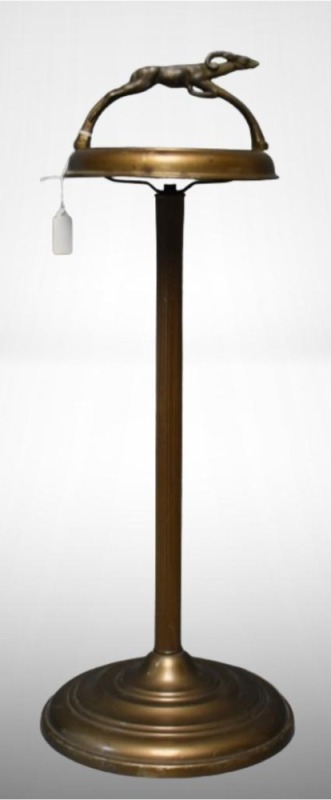 Metal Art Deco-style floor ashtray stand featuring a stylized gazelle as a handle, 27" tall