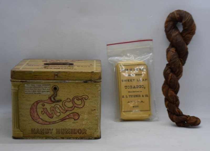 Cinco Handy Humidor; Civil War era twist of plug tobacco; Queen of the West Sweet Leaf Tobacco pouch