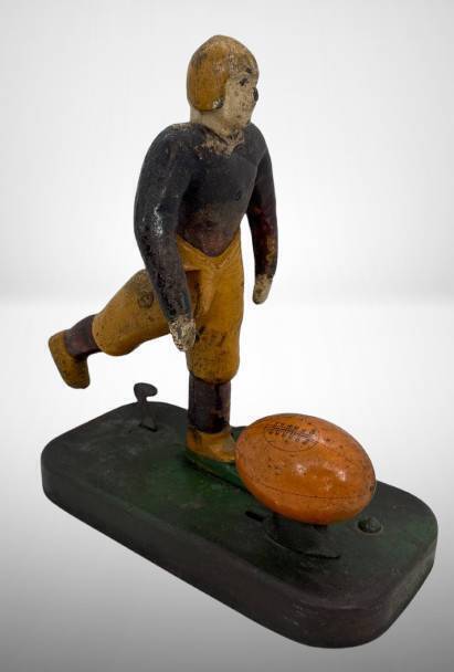Wolsey Cast Iron Mechanical Football Toy, 8" tall