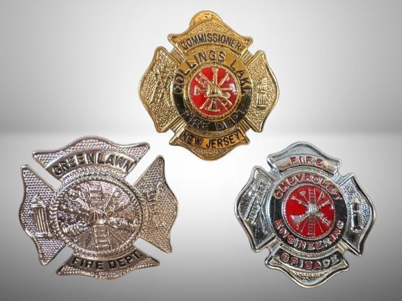 Three Fire Department Badges