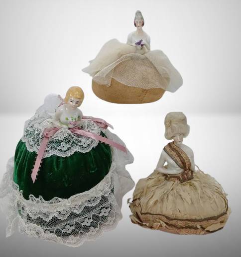 Three Porcelain Half-Doll Pin Cushions