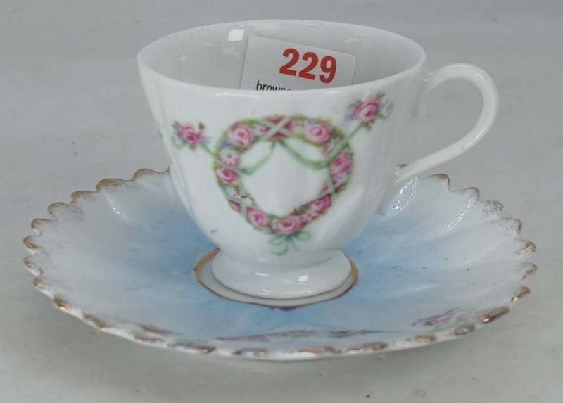 Porcelain Demi-Cup and Saucer with Floral Design