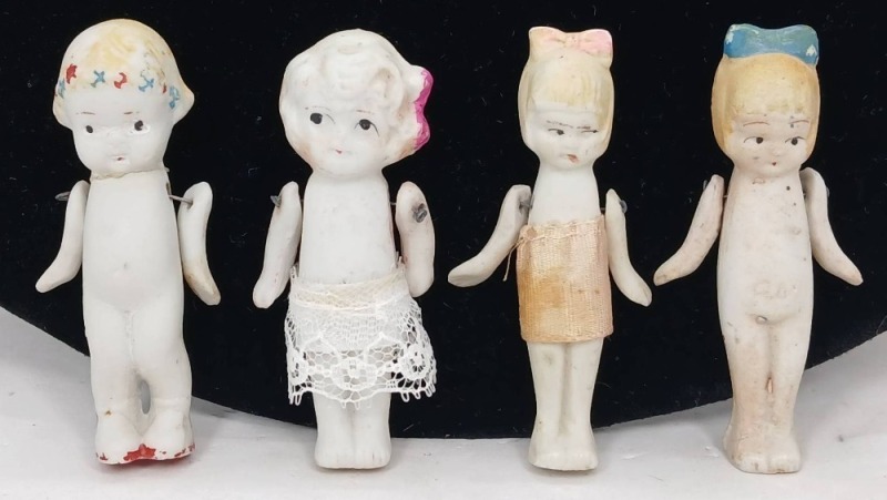 Four Bisque Dolls Marked Japan