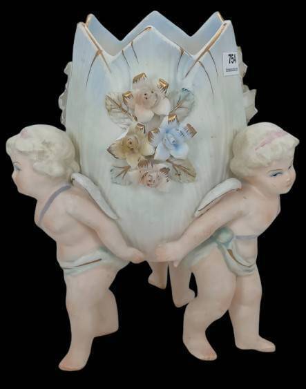 Porcelain Cherub Vase with Floral Accents