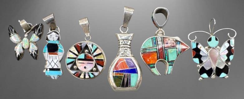 Five Sterling Silver Pendants