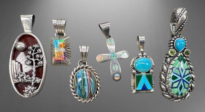 Six Sterling Silver Pendants