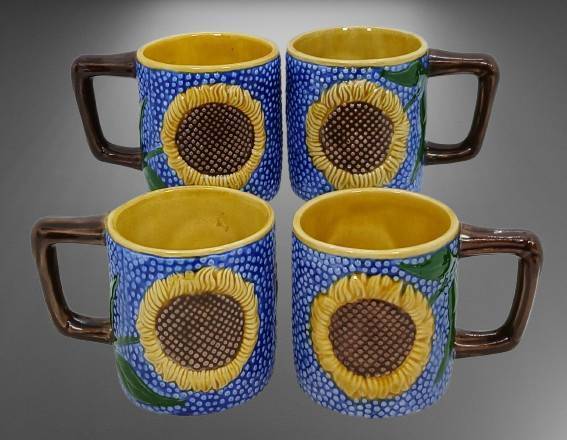 Four 1991 MMA Majolica Mugs