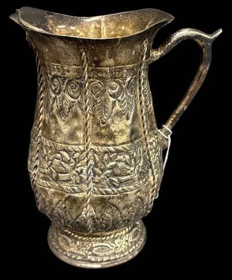 Ornate Silver-Colored Pitcher