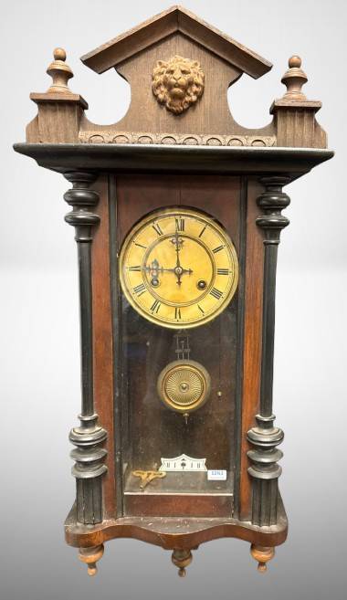 Ornate Wooden Wall Clock with Lion's Head