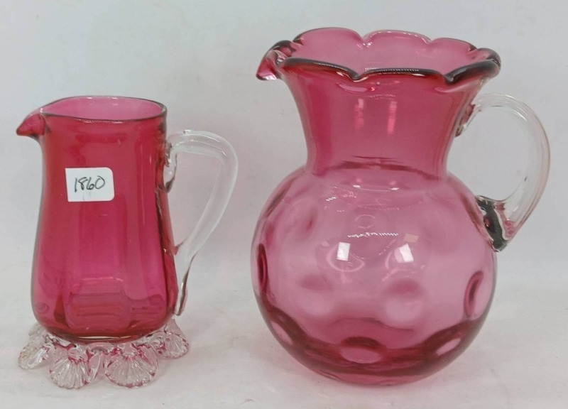 (2) Cranberry Glass Pitchers