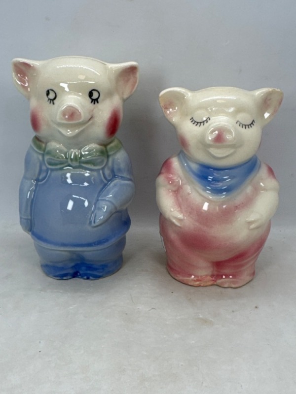 (2) Shawnee Pottery pig banks