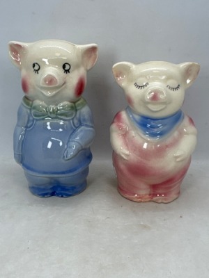 (2) Shawnee Pottery pig banks