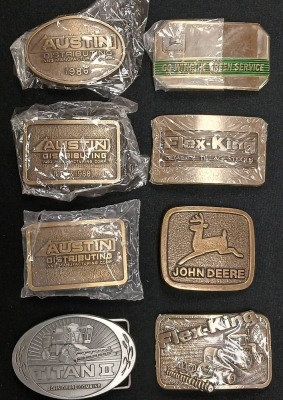 Assortment of (8) Advertising Belt Buckles