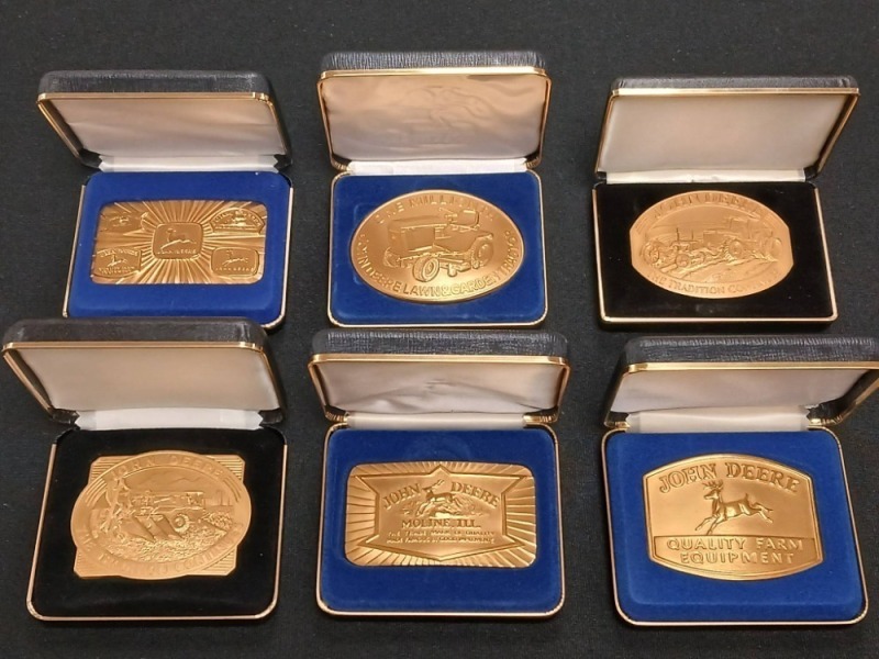 (6) John Deere LE Belt Buckles