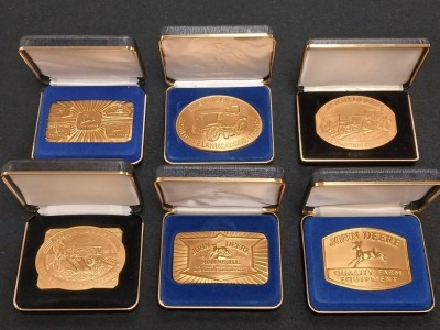 (6) John Deere LE Belt Buckles