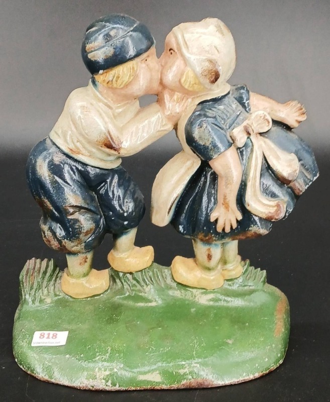 Cast Iron Doorstop Featuring Kissing Dutch Couple