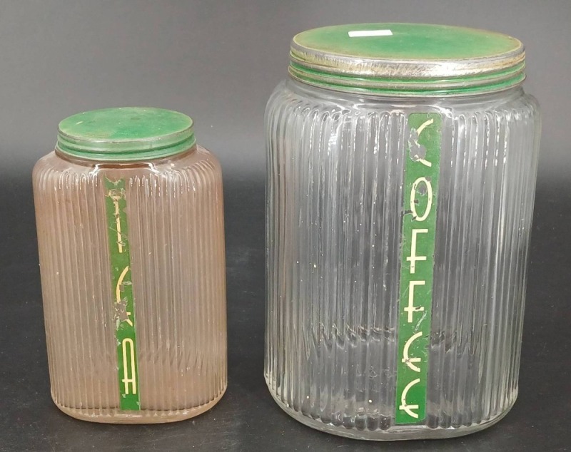 Two Glass Canisters With Lids